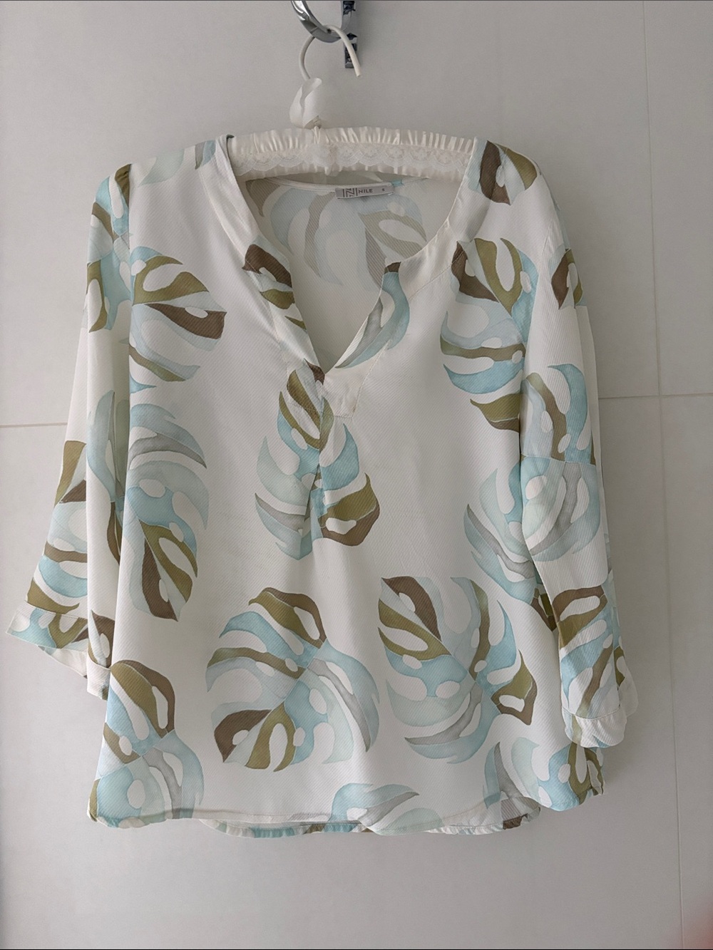 Nile White Leaf-Print V-Neck Blouse with Aqua and Olive Accents